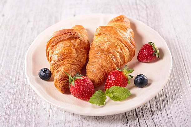 istock croissant and berry fruit 481081458