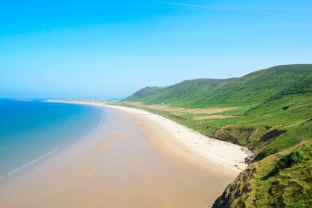 Rhossili Bay Rhossili Bay Beach, Gower Peninsula, Wales.  gower peninsular stock pictures, royalty-free photos & images