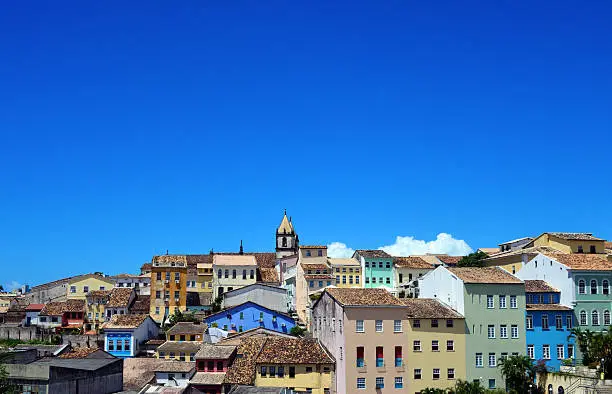 Salvador da Bahia, Bahia, Brazil: colonial architecture in the old historic centre - old city skyline - Pelourinho - bell towers of São Francisco church and blue sky with copy space - photo by M.Torres