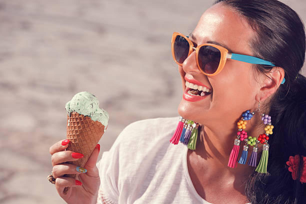 istock Happy woman enjoying in ice cream 481086568