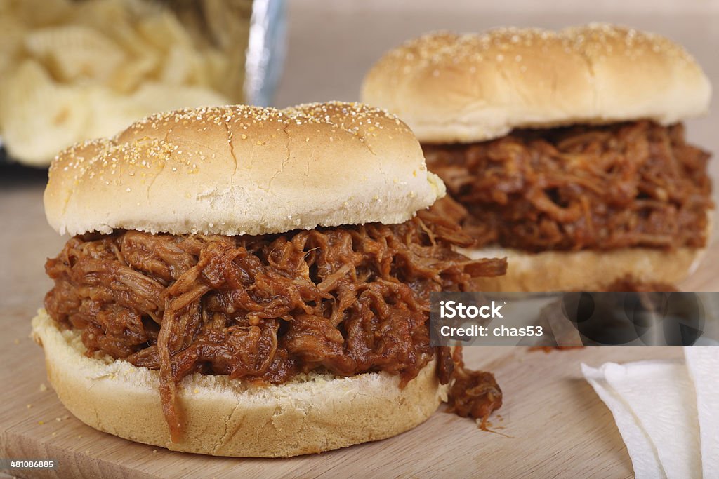 Pulled Pork Sandwichs Closeup of a barbeque pulled pork sandwich Barbecue - Meal Stock Photo