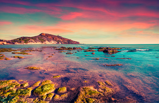Colorful spring sunset from the Giallonardo beach, Sicily, Italy, Tyrrhenian sea, Europe. Instagram toning.