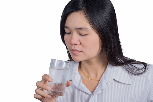 istock Asian women drinking water.Isolated on the white blackground. 481091138