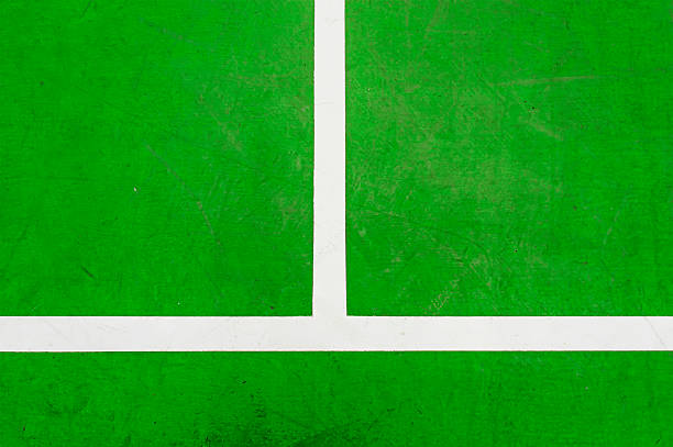 istock white line on Green Tennis court 481094461