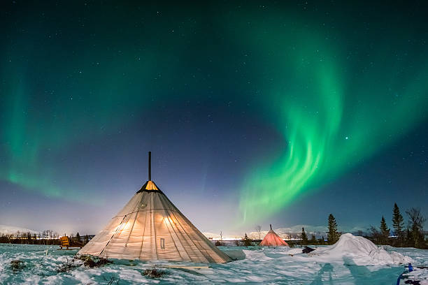 istock Northern Lights above Sami Lavvu 481094548