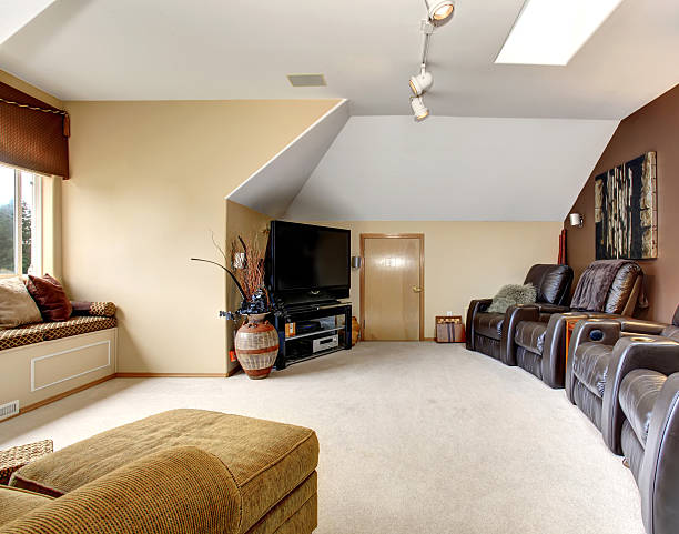 istock Great home theater room with recliners and carpet. 481095210