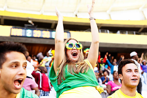 istock Goal! Ecstatic female soccer fan cheers her team 481098371