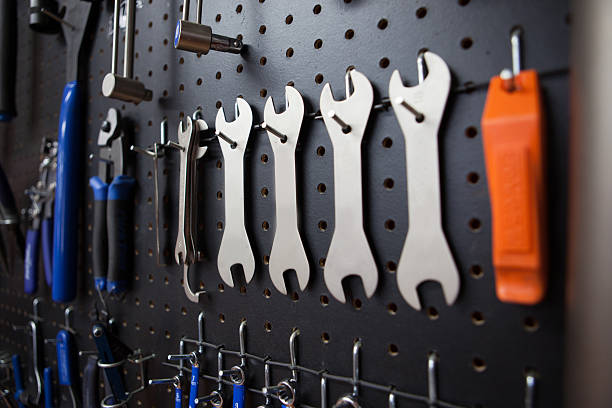 istock Wrenches hanging in a bicycle shop 481098909