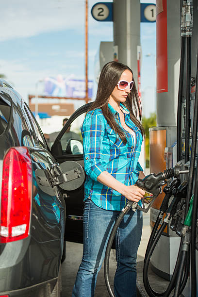 istock Female at gas station 481099125