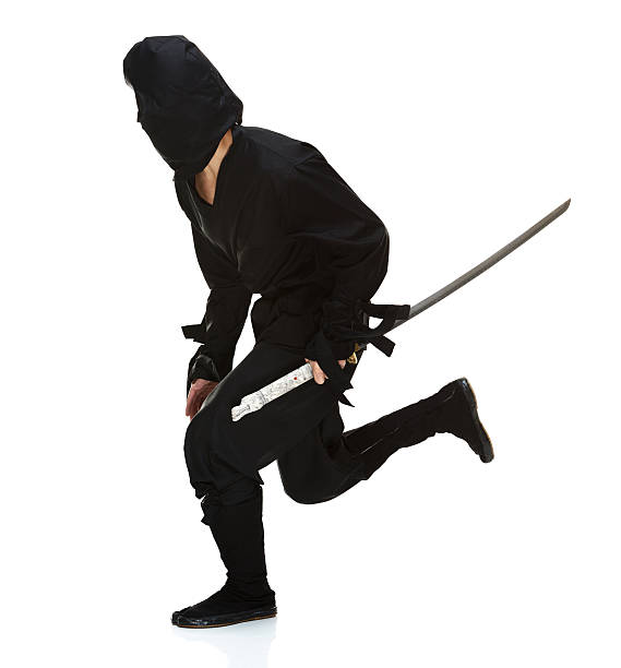 istock Side view of ninja running with sword 481102353