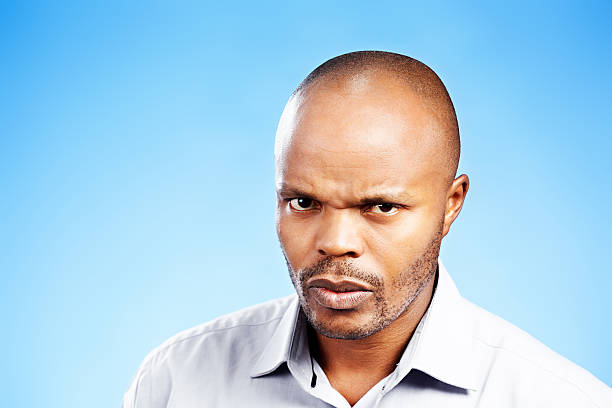 istock Mature man gives challenging, serious stare 481105205