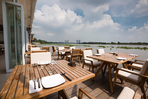 Ho Chi Minh City, Vietnam - June 7, 2015 at a floating restaurant on Saigon River. here only serves European cuisine