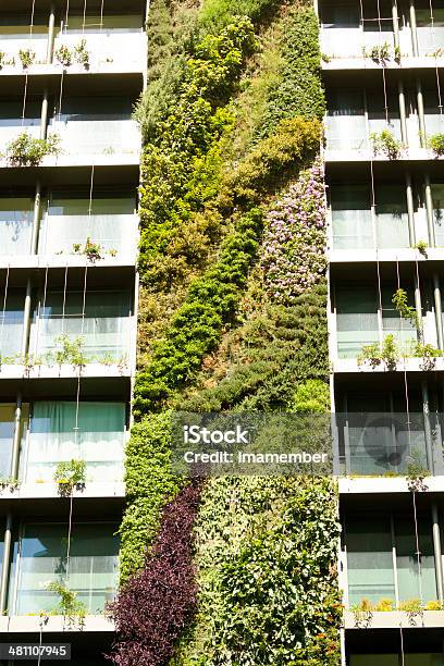 Vertical Gardengreen Wall On Apartment Building Stock Photo - Download Image Now - Building Exterior, Sustainable Resources, Architecture