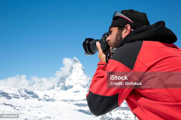 Man Photographer Taking Picture With Dslr Camera Of Matterhorn Switzerland Stock Photo - Download Image Now