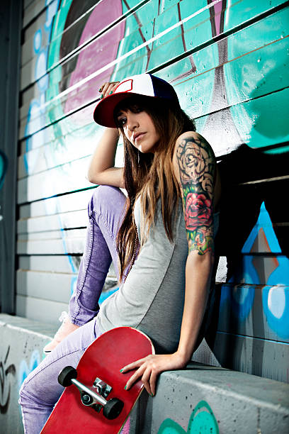 istock Young Woman With Skateboard 481117121