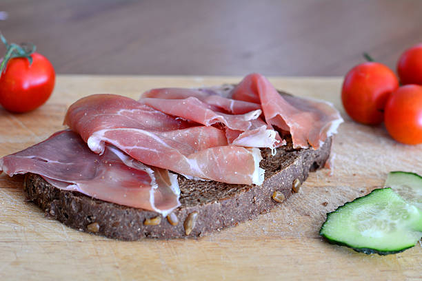 istock Fresh and healthy wholemeal bread with ham and vegetables 481119208