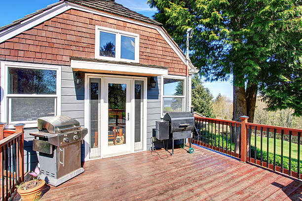 Perfect porch with view of greenery. Perfect porch with view of greenery Combining Doors and Decks for a Smooth Look stock pictures, royalty-free photos & images