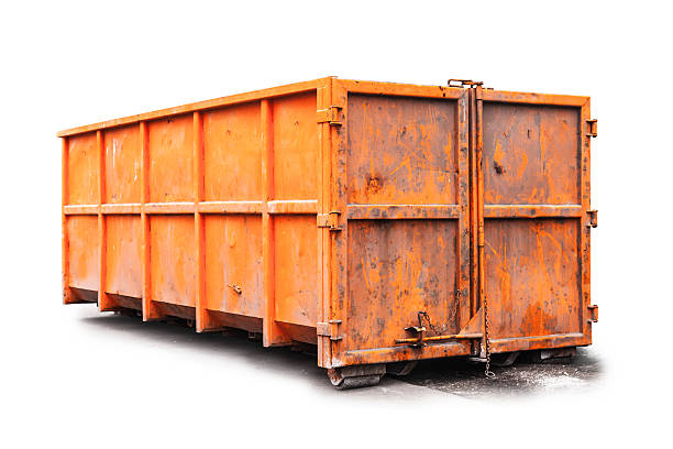 istock Big metal orange trash container isolated on white 481121507