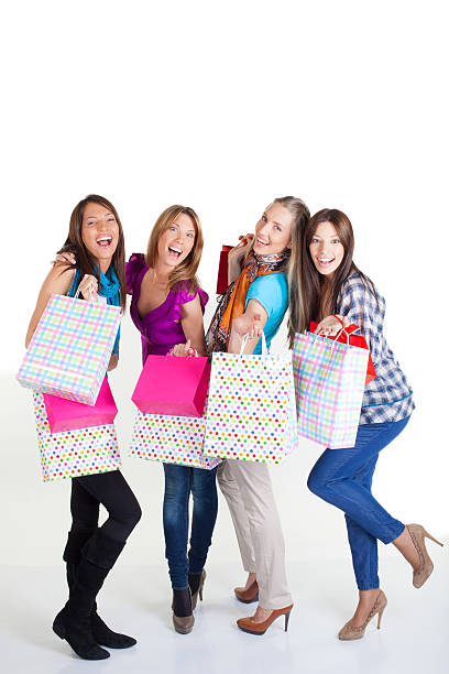 istock Beautiful young women shopping 481124027