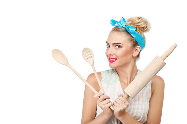 istock Attractive young girl is preparing to cook 481124158