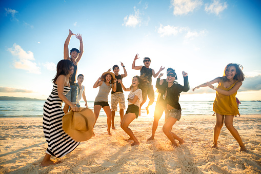 Happy young people on beach