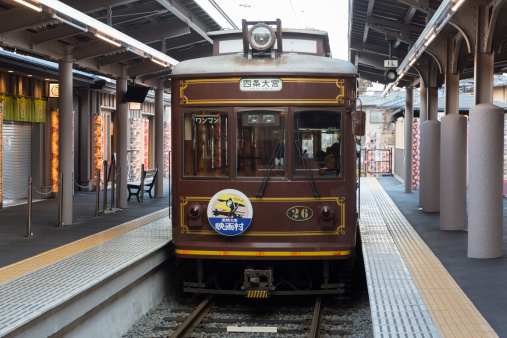 Kyoto, Japan - March 6, 2014 : Randen train in Randen Arashiyama Station, Kyoto, Japan. Randen was founded in 1910. It has been running for over 100 years.