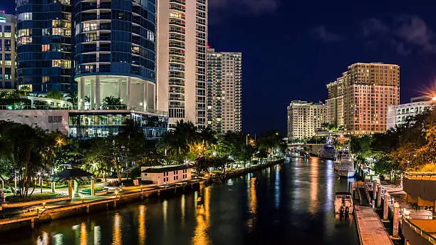 Nighttime at Riverwalk on Tarpon River in Fort Lauderdale, Florida was taken from South Andrews Avenue bridge. Exif data ISO 200, F/8.0, 13 seconds, 18mm.