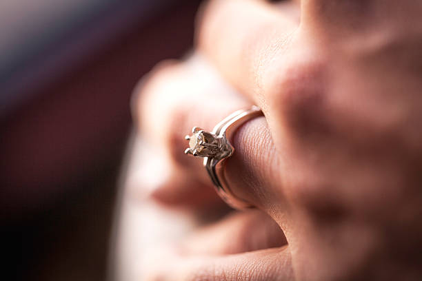 istock Engagement diamond ring on woman finger 481130477