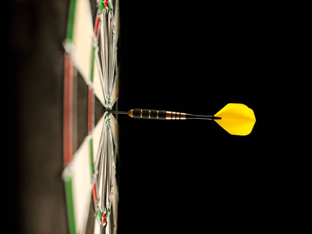 istock Dartboard with a Bull's Eye Scoring Dart 481136011