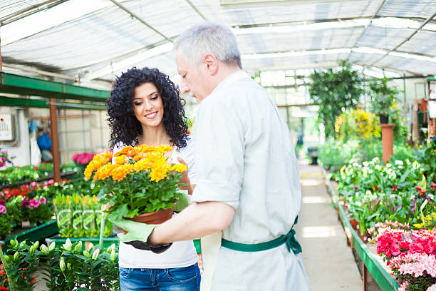 istock Florist selling flowers to a customer 481137949