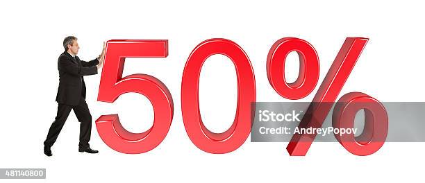Businessman Pushing 50 Sale Sign Stock Photo - Download Image Now - 2015, Adult, Adults Only