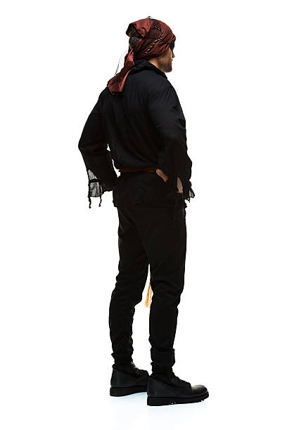 istock Rear view of pirate standing with hands on hips 481145977