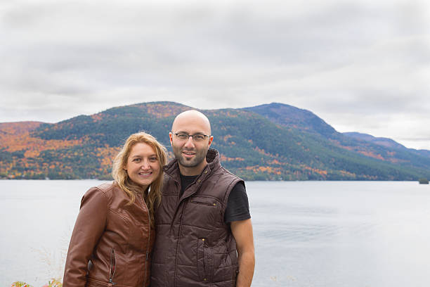 istock caucasian couple wearing brown leather jacket, posing camera in Autumn 481152082