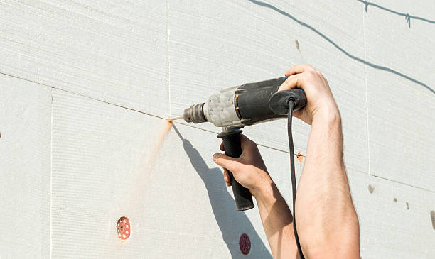 istock The process of drilling holes in the white polyfoam 481152566