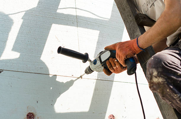 istock The process of drilling holes in the white polyfoam 481152600
