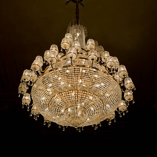 istock Chrystal chandelier with black background 481158100