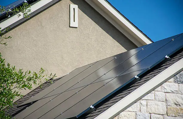 Photo of Austin Home Rooftop Solar Panels Renewable Energy Independence