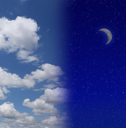 Night sky filled with stars and crescent moon beside cloud filled blue sky
