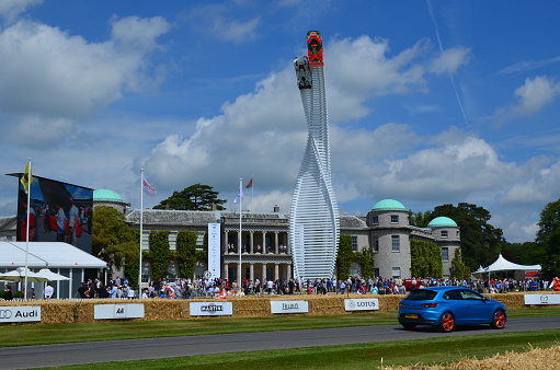 Goodwood, United Kingdom - June 25, 2015: The main display at the 2015 Goodwood Festival of Speed of Mazda Le Mans race cars in front of Goodwood House.