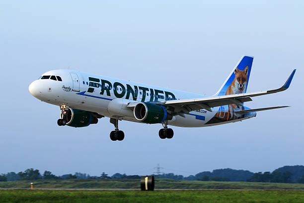 Frontier Airlines A320 Landing at Cleveland Hopkins International Airport stock photo