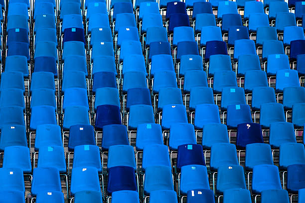 istock Stadium of dark blue seats abstract background 481171894