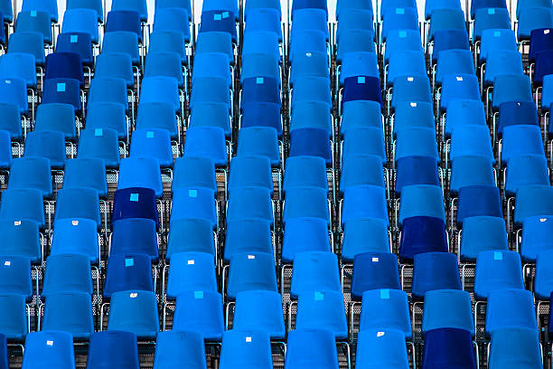 istock Stadium of dark blue seats abstract background 481171910