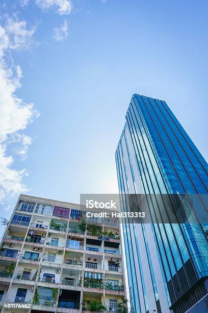 The Modern Tower And Old Building Stock Photo - Download Image Now - 2015, Abstract, Architectural Column