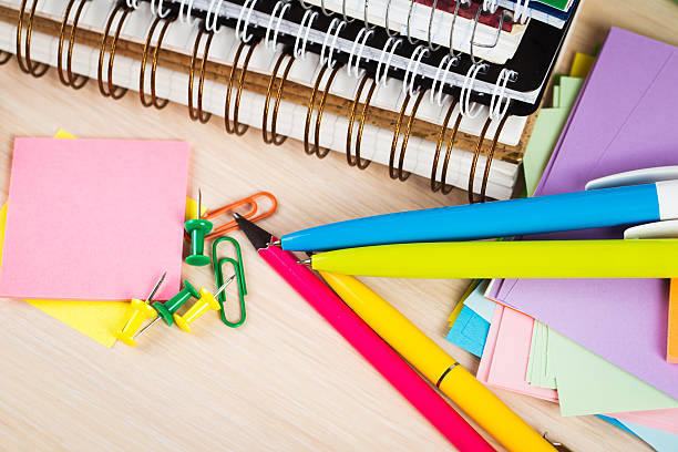 istock School and office accessories on wooden background 481176672