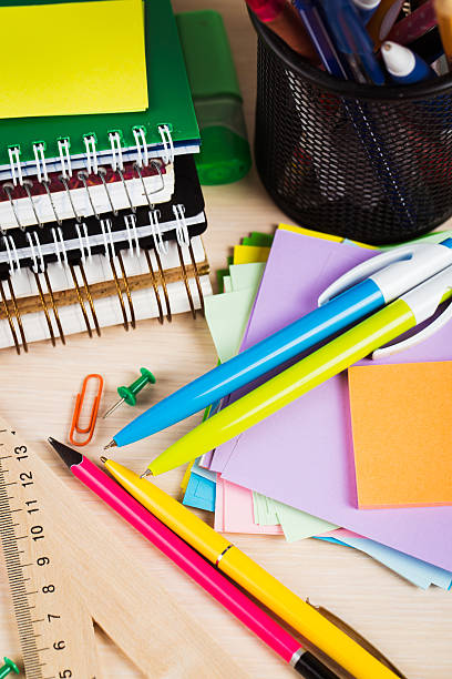 istock School and office accessories on wooden background 481176692
