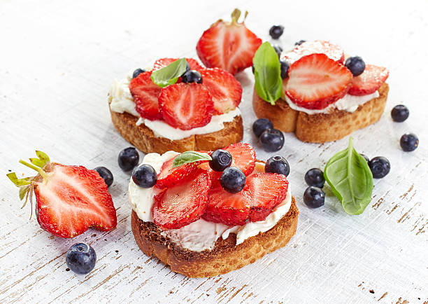 istock toasted bread with cream cheese and strawberries 481182380