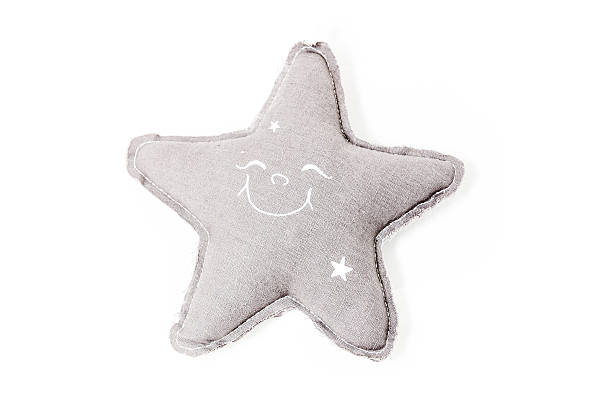 Cтоковое фото Декоративные фаршированные star cuddle игрушка изолированные на белом