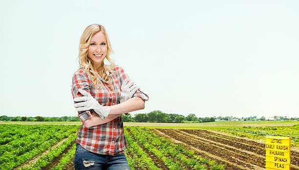 istock Smiling female farmer at the farm 481186774