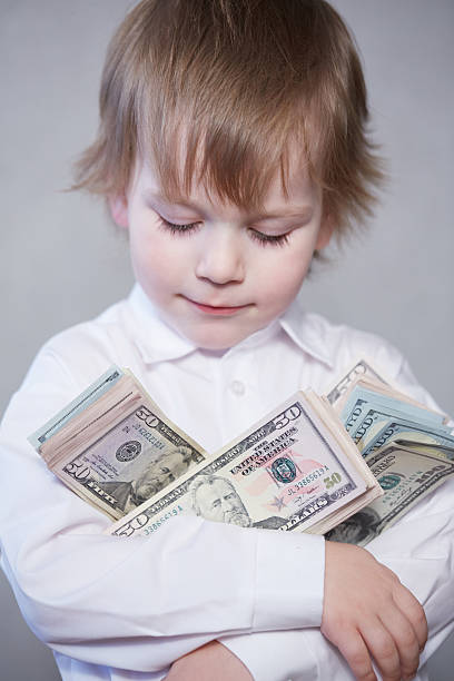 istock money in children's hands 481187346