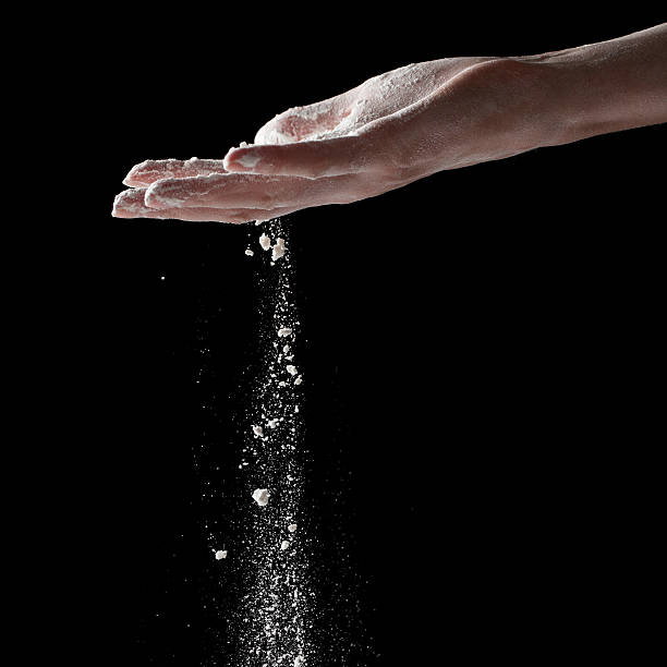 istock woman coating her hands in powder chalk magnesium 481188278